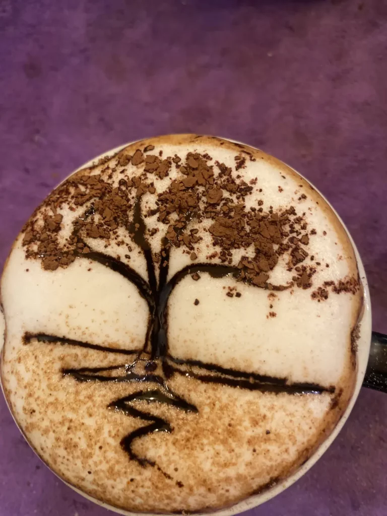Amazing mocha art of a tree on top of a frothy mocha at the cafe that serves the best food in Chalong: Poached Breakfast Cafe, Chalong, Phuket, Thailand