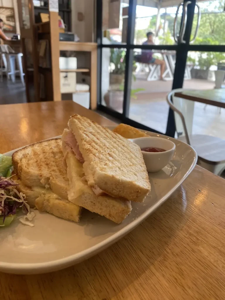 Ham and Cheese toastie near a window. This is the best meal in Chalong and can only be found at Poached Breakfast Cafe, Chalong, Phuket, Thailand