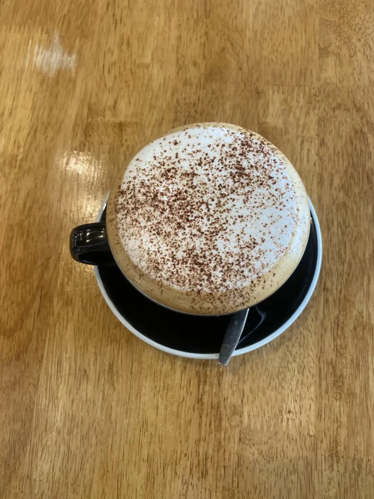 Cappuccino with frothy foam and chocolate dusting. Pairs pretty well with french toast in Chalong. Only at Poached Breakfast Cafe, Chalong, Phuket, Thailand