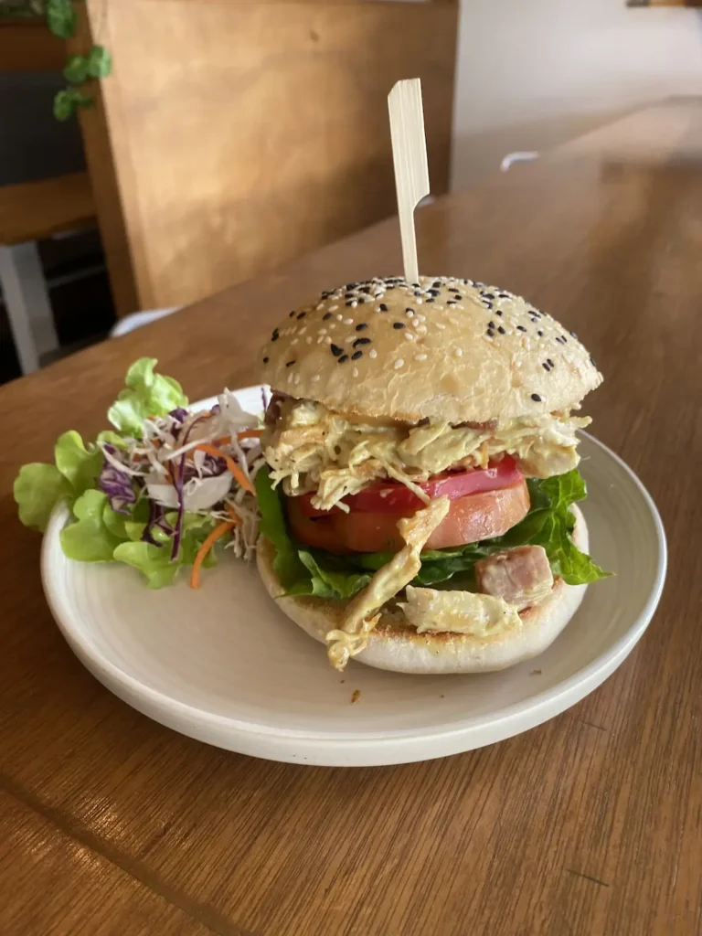 Curried Pulled Chicken Salad on a Seeded Sandwich Roll. A good alternative for french toast in Chalong. Only at Poached Breakfast Cafe, Chalong, Phuket, Thailand