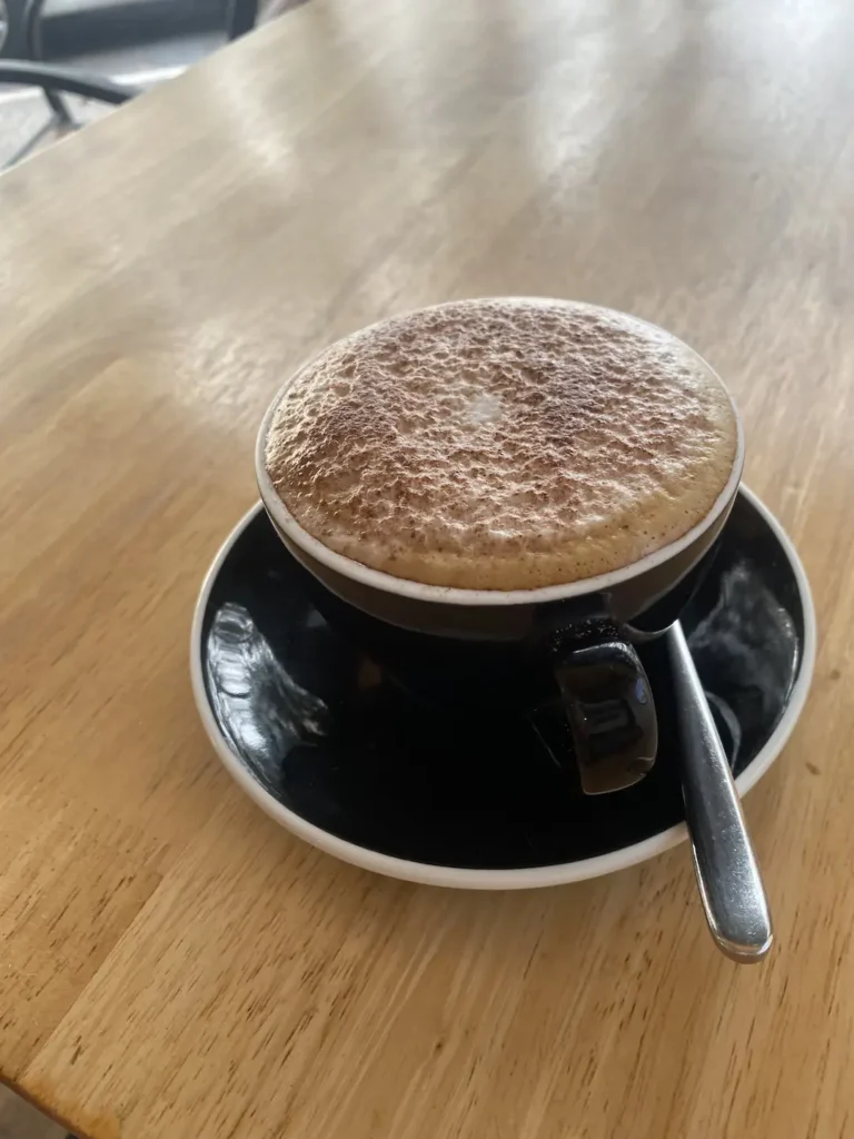 Delicious, foamy cappuccino. Only at the best spot to see before you head to one of the amazing islands to visit near Phuket: Poached Breakfast Cafe, Chalong, Phuket, Thailand