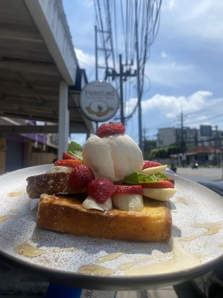 French Toast with banana, ice cream and strawberries at a cafe with good coffee in Chalong at Poached Breakfast Cafe, Chalong, Phuket, Thailand